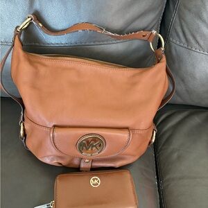Brown Michael Kors shoulder bag with zip closure wallet